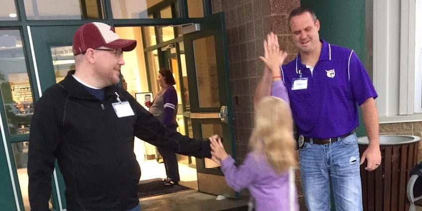 Matt Sims of Southern Heights Baptist Church and Craig Hicks of the Berryville Police Department served among dozens of Bright Futures Berryville "Champions" in April by greeting students every morning as they arrived for a day packed with standardized testing. The students loved it!