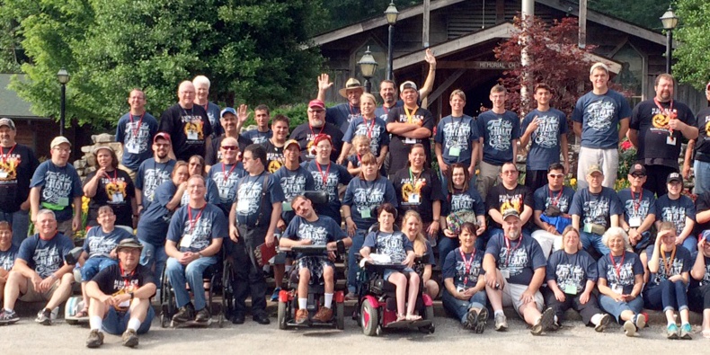 Special Touch Getaway Camp guests at the Mid-America location just west of Siloam Springs, Arkansas, show off their Kerusso Christian T-shirts in a group photo taken last year. Special Touch Ministry has operated camps for people of all ages who have intellectual and physical disabilities for 35 years.